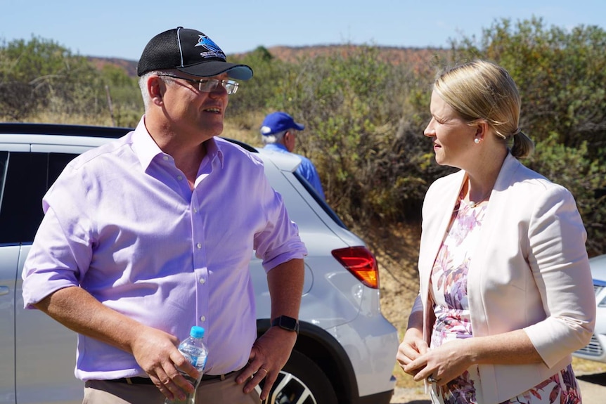 Federal Treasurer Scott Morrison speaks with the NT Government's Nicole Manison