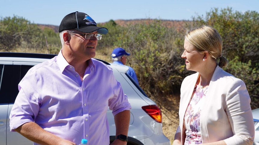 Federal Treasurer Scott Morrison speaks with the NT Government's Nicole Manison