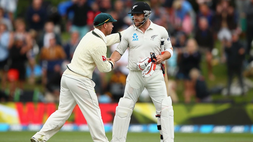 Australia's David Warner congratulates NZ's Brendon McCullum after his final Test innings.