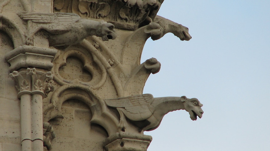 Gargoyles look out to the horizon on a cathedral