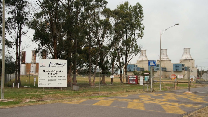 A road leading into the gated entrance of the Jeeralang Power Station.