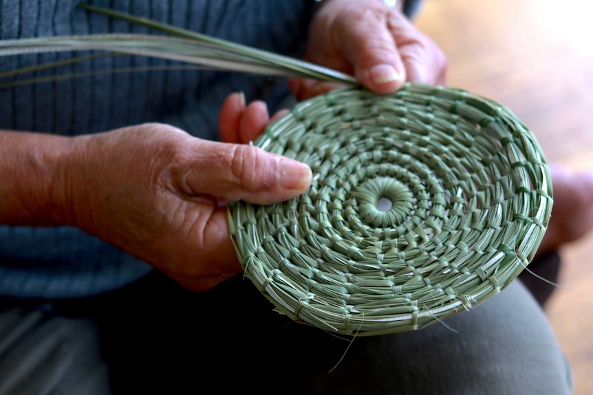 Close up photo of circular basket weaving