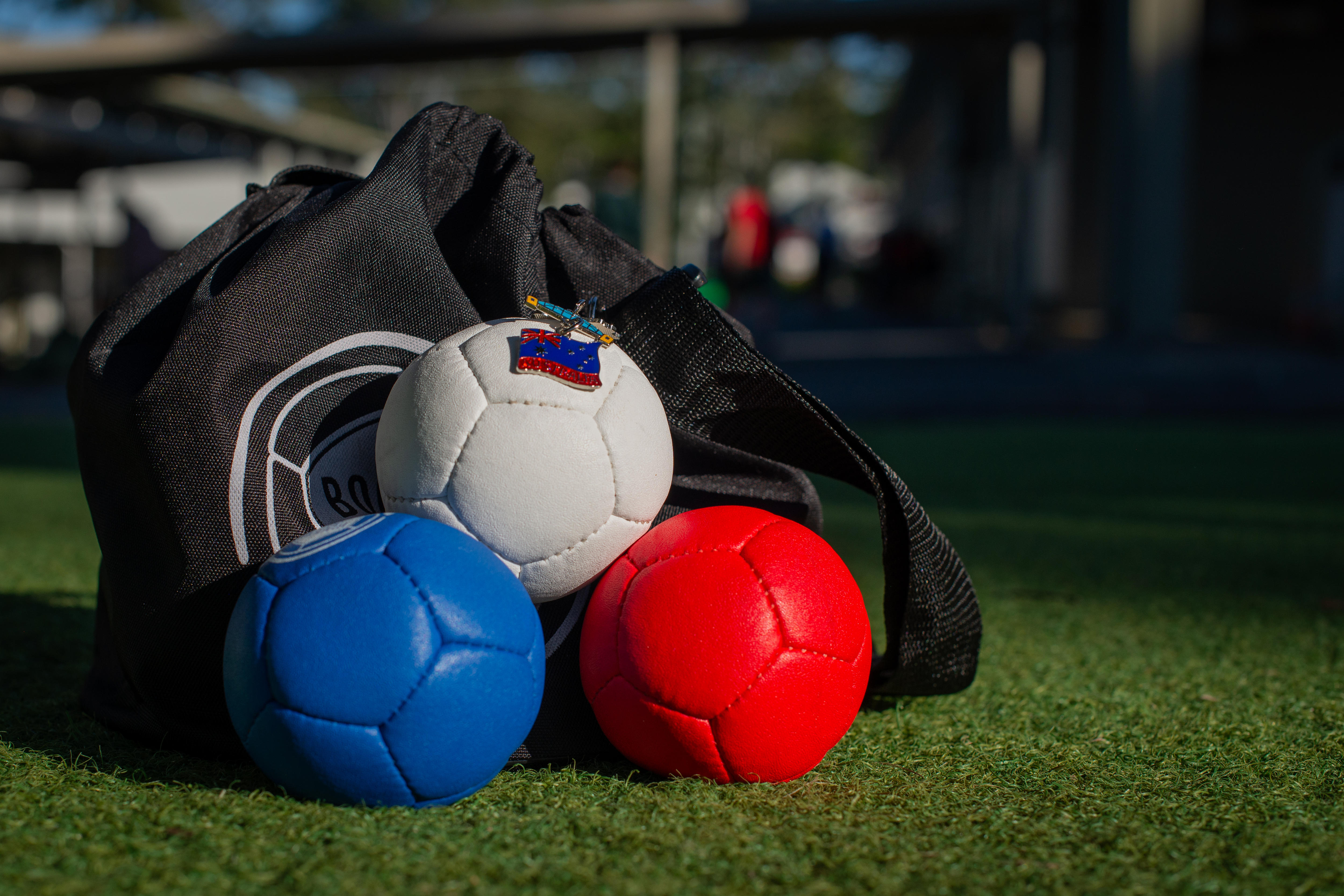 a set of three balls resting on each other.