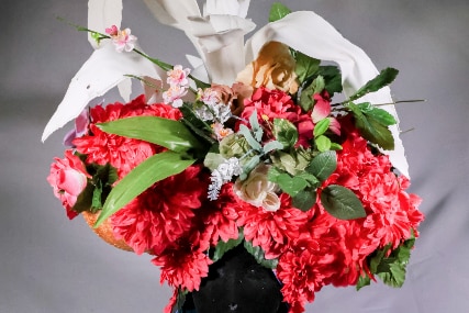 A spectacular red and white floral head dress from Spotlight Theatre's costume department 