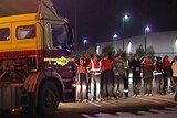 Coles employees at a national distribution centre in Melbourne's north set up a picket line.