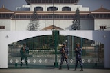Nepalese riot police stand guard in front of parliament