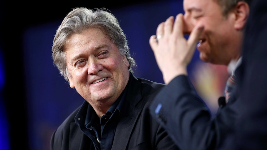 White House Chief Strategist Stephen Bannon listens as White House Chief of Staff Reince Priebus speaks.