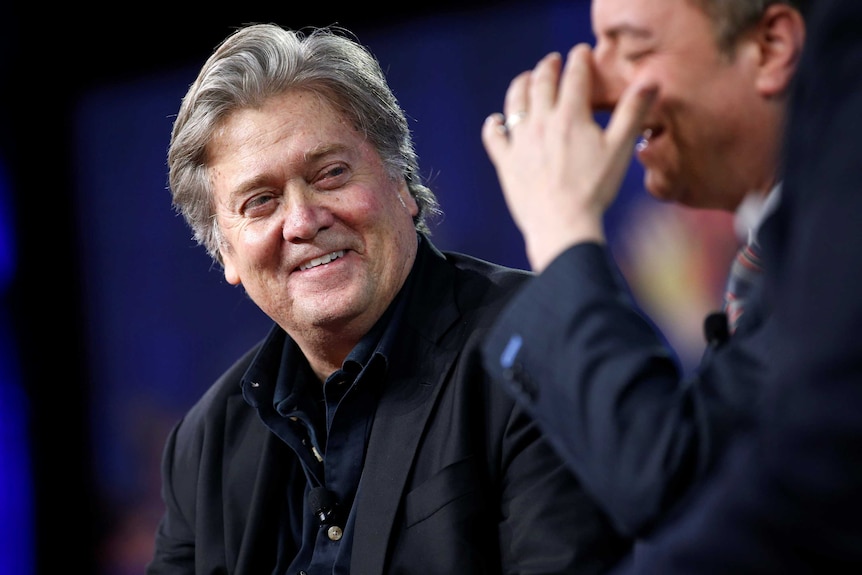 White House Chief Strategist Stephen Bannon listens as White House Chief of Staff Reince Priebus speaks.