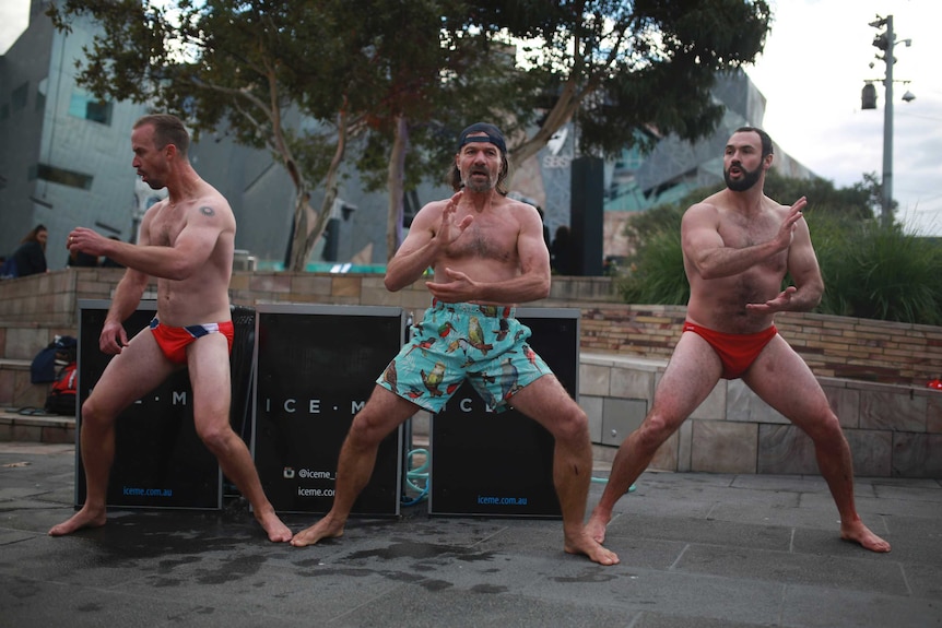 Ben Anderson Wim Hof, Michael Hole, pose in bathers at Federation Square