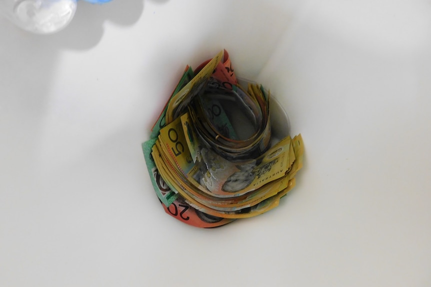 Cash inside the toilet.