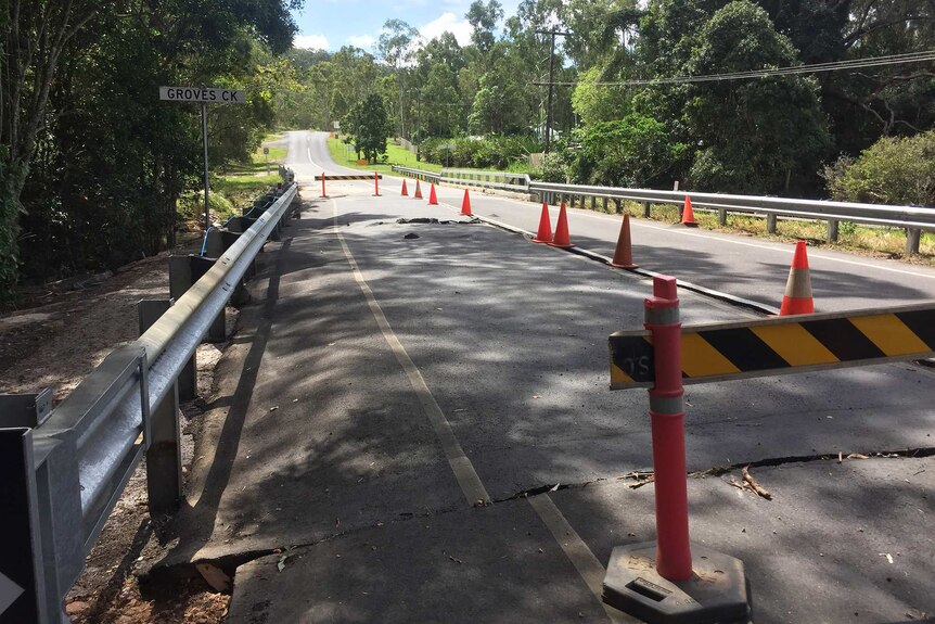 A bridge damaged by flooding on March 27, 2018, over Groves Creek at Speewah in far north Queensland.