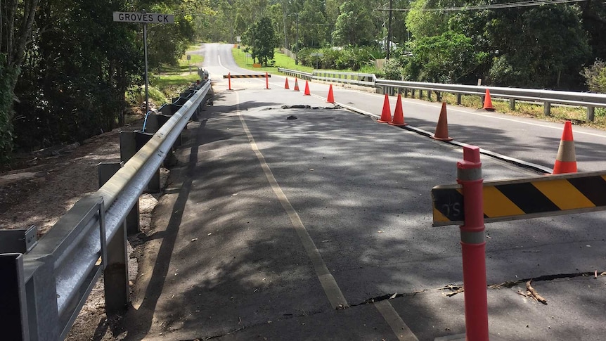 A bridge damaged by flooding on March 27, 2018, over Groves Creek at Speewah in far north Queensland.