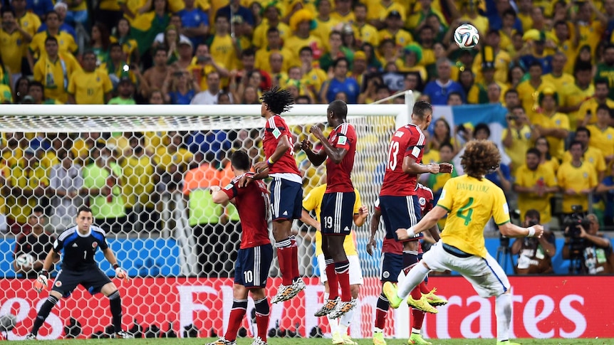 David Luiz belts home a free kick against Colombia