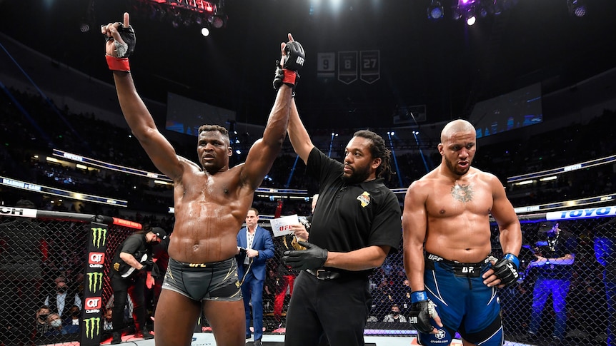 Francis Ngannou celebrates after his victory over Ciryl Gane in their UFC heavyweight championship fight