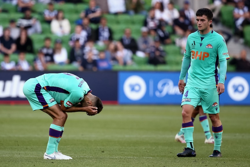 Perth Glory player crouches