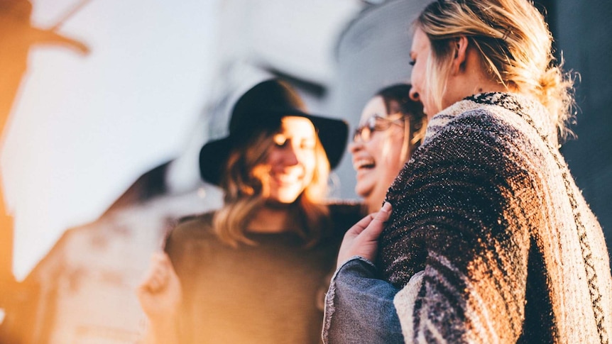 Small group of women at a social gathering