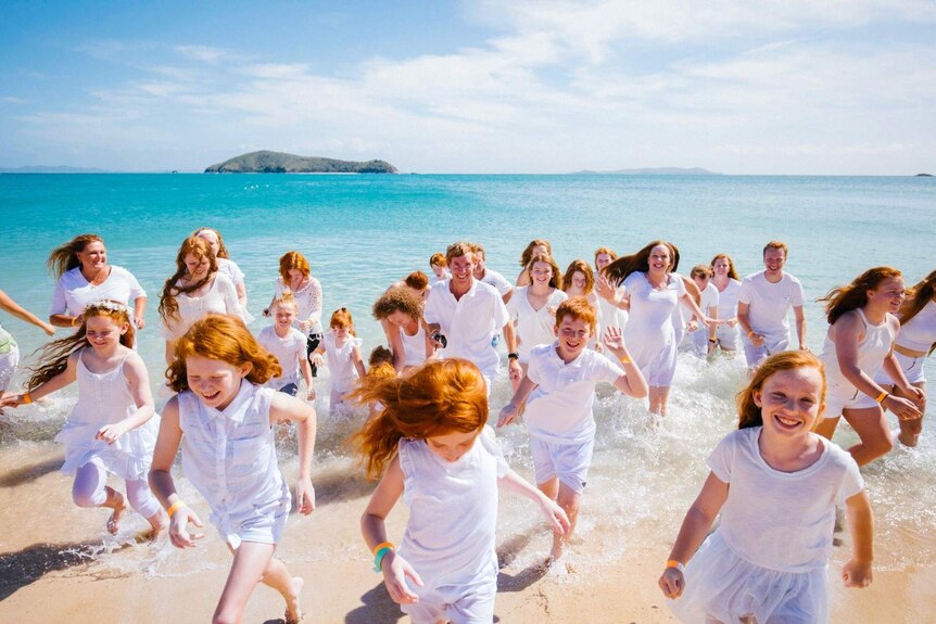 Fair-skinner, red-haired people at beach