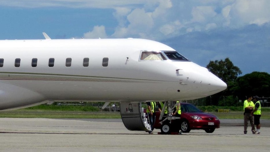 Oprah Winfrey's private jet sits on the tarmac at Cairns Airport