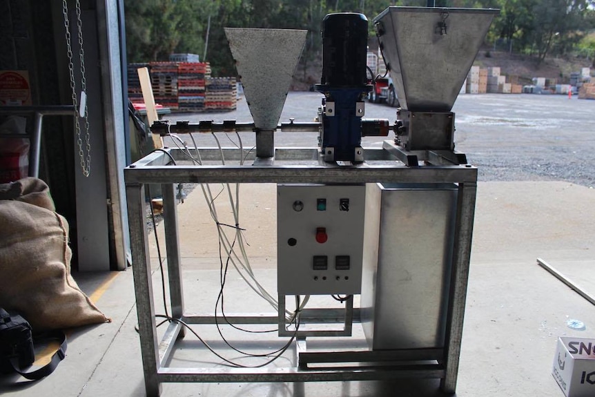 A small, portable machine which can shred and extrude plastics to be transformed into new products.