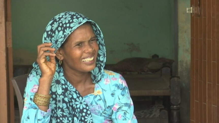Babita Malika wears a blue scarf and talks about how she moved thousands of kilometres away form Tripura.