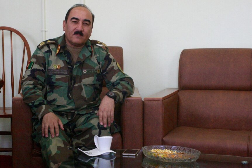 Head of ANAOA, Commandant Brigadier General Muhammad Sharif Sharifi,  in his office at the academy.