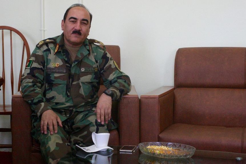 Head of ANAOA, Commandant Brigadier General Muhammad Sharif Sharifi,  in his office at the academy.