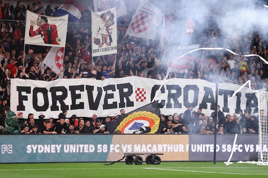 Sydney United fans hold up Croatia themed banners