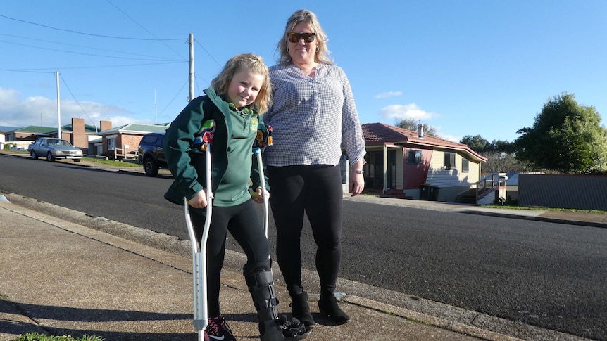 Belinda Hay with her daughter Tilly, who broke her ankle at Montello Primary School, July 2019