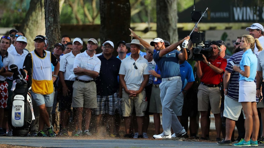 Australia's Jason Day plays from the rough on day two of the Players Championship in Florida.