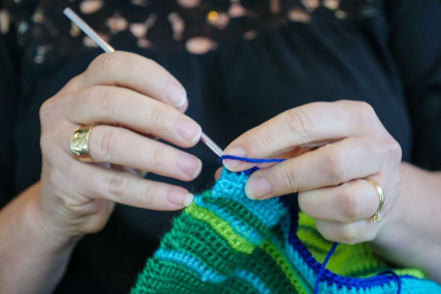 Hand crocheting.