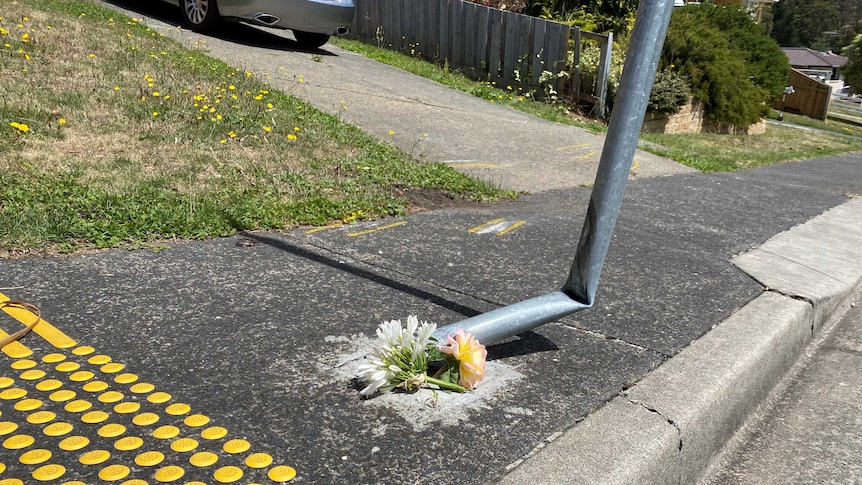 Flowers left at scene of fatal motorcycle crash in Claremont, Hobart, which killed 14 year old