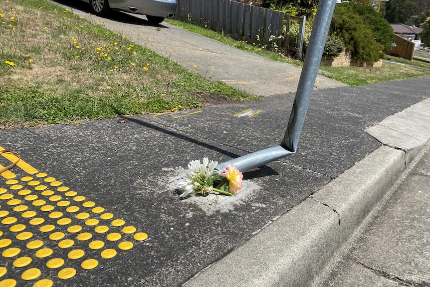 Flowers left at scene of fatal motorcycle crash in Claremont, Hobart, which killed 14 year old