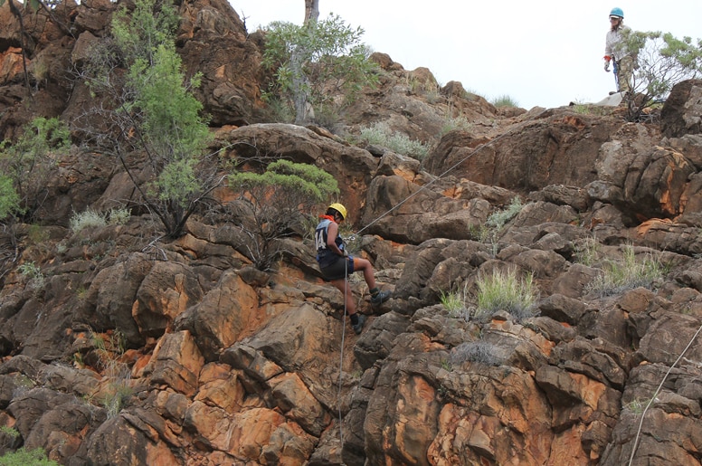 A teenager abseils during a NT Corrections bootcamp.