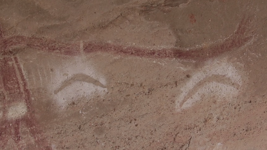 Ancient cave paintings of boomerangs.