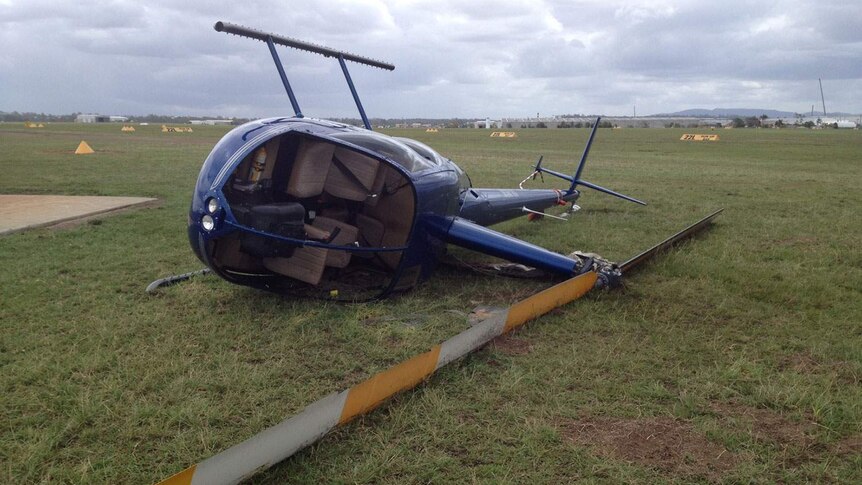 Robinson R44 helicopter lies on its side at Archerfield airport