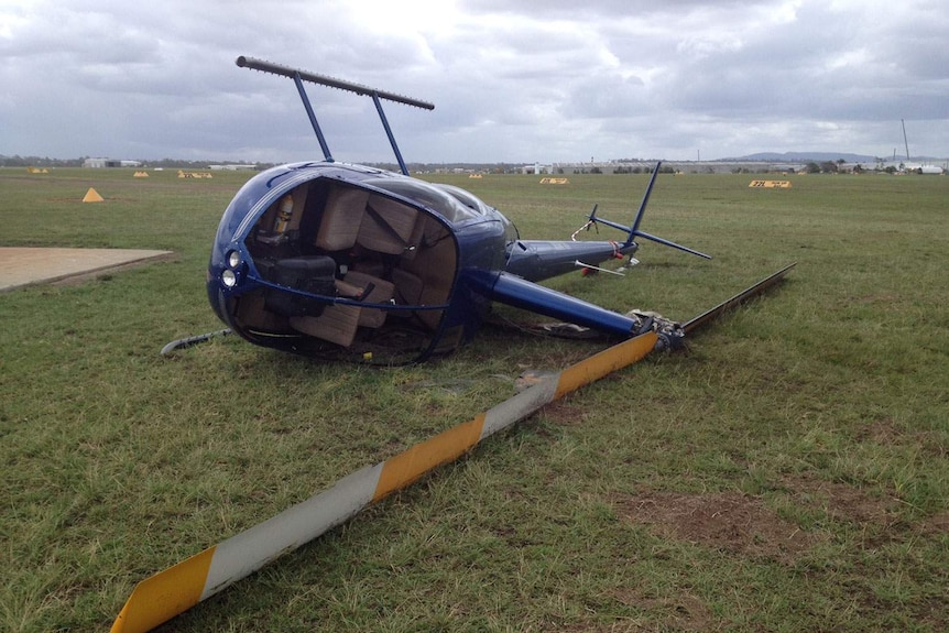 Robinson R44 helicopter lies on its side at Archerfield airport