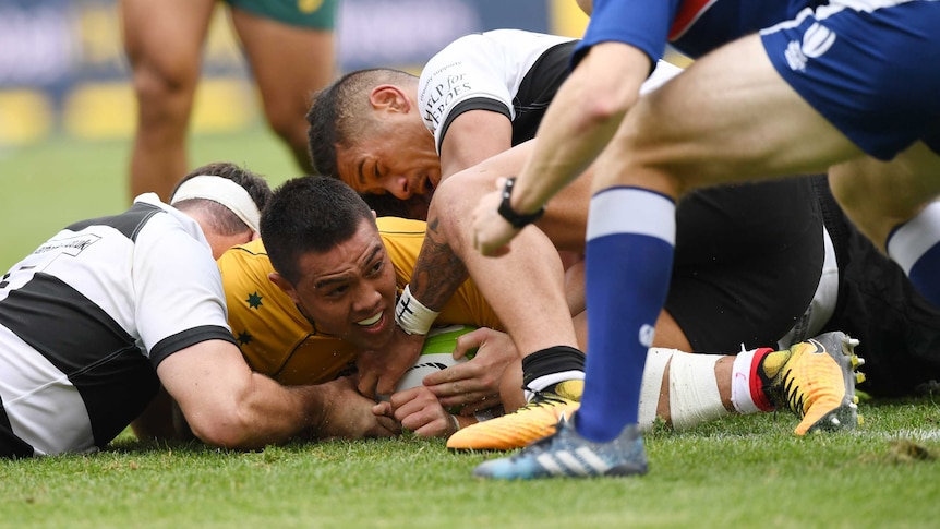 Wallabies' Duncan Paia'aua scores try against the Barbarians