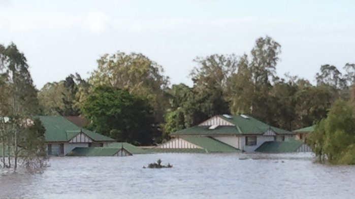Floodwaters submerge units at Brassall