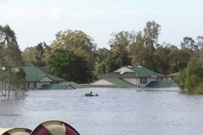 Floodwaters submerge units at Brassall