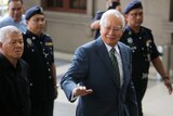 Najib Razak arrives at the High Court of Malaya in Kuala Lumpur.