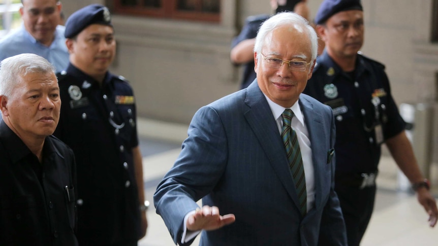 Najib Razak arrives at the High Court of Malaya in Kuala Lumpur.