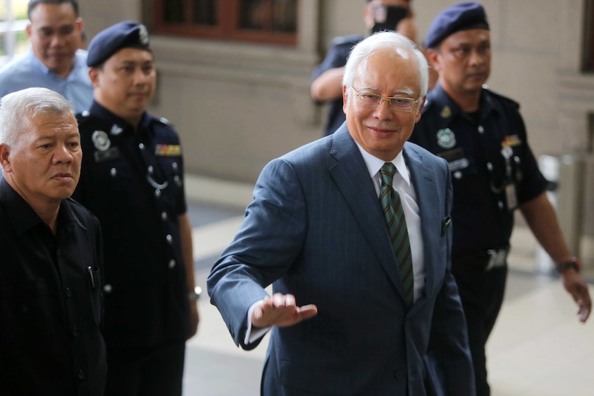 Former Malaysian Prime Minister Najib Razak arrives at High Court of Malaya in Kuala Lumpur