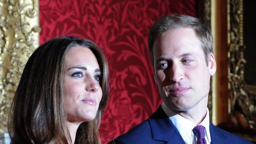 Prince William looks at Kate Middleton
