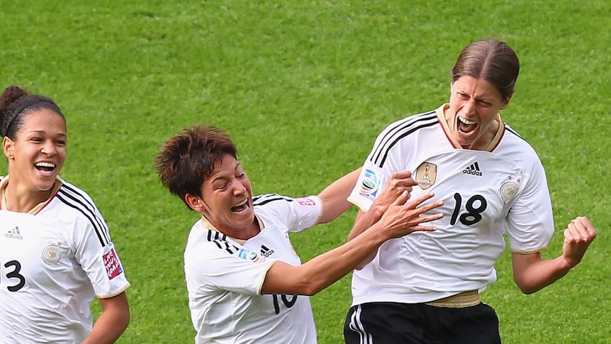 Fantastic start ... Kerstin Garefrekes celebrates scoring Germany's opening goal.