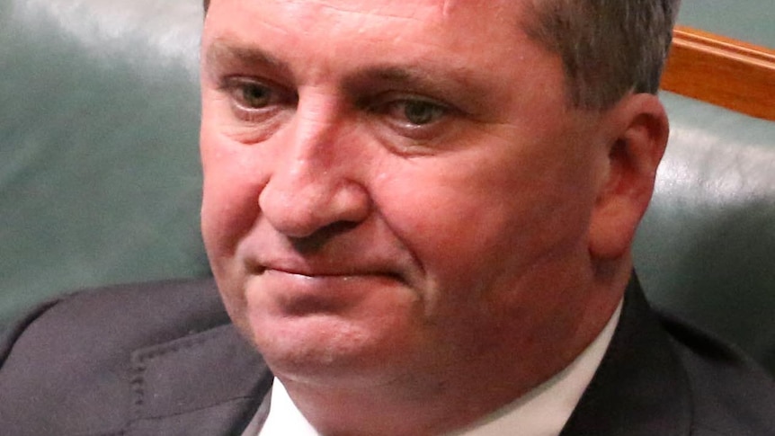 Close up of Barnaby Joyce sitting on the front bench in the House or Representatives chamber.