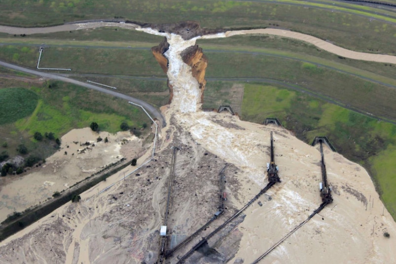Floodwaters enter a large open cut coal mine.