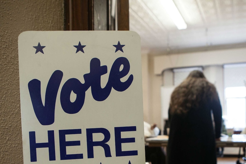 Voters cast ballots at a school in Massachusetts on Super Tuesday.