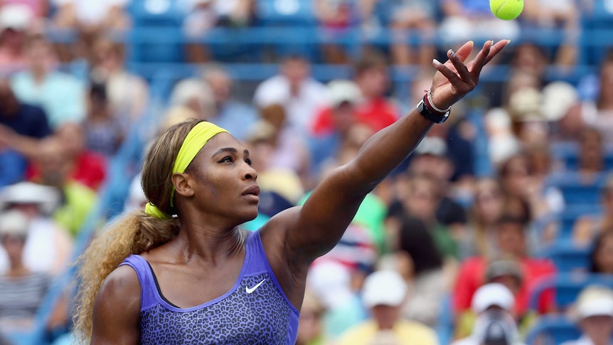Serena Williams serves at Cincinnati Open