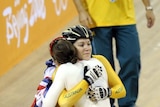 Anna Meares and Victoria Pendelton hug after the women's sprint final