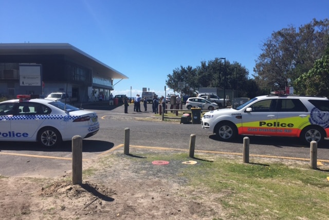 Police at the scene of a shark attack at Lighthouse Beach, Ballina.